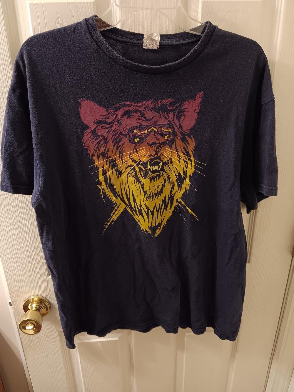 Delta Navy Short Sleeve Tee with Yellow and Maroon Lion Graphic